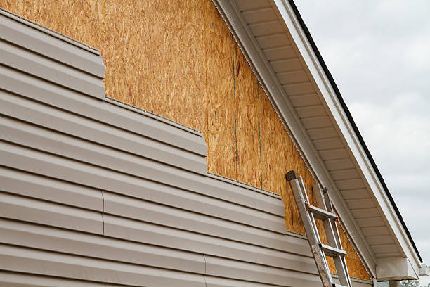 Professional Siding Installation technician working in Milton, GA